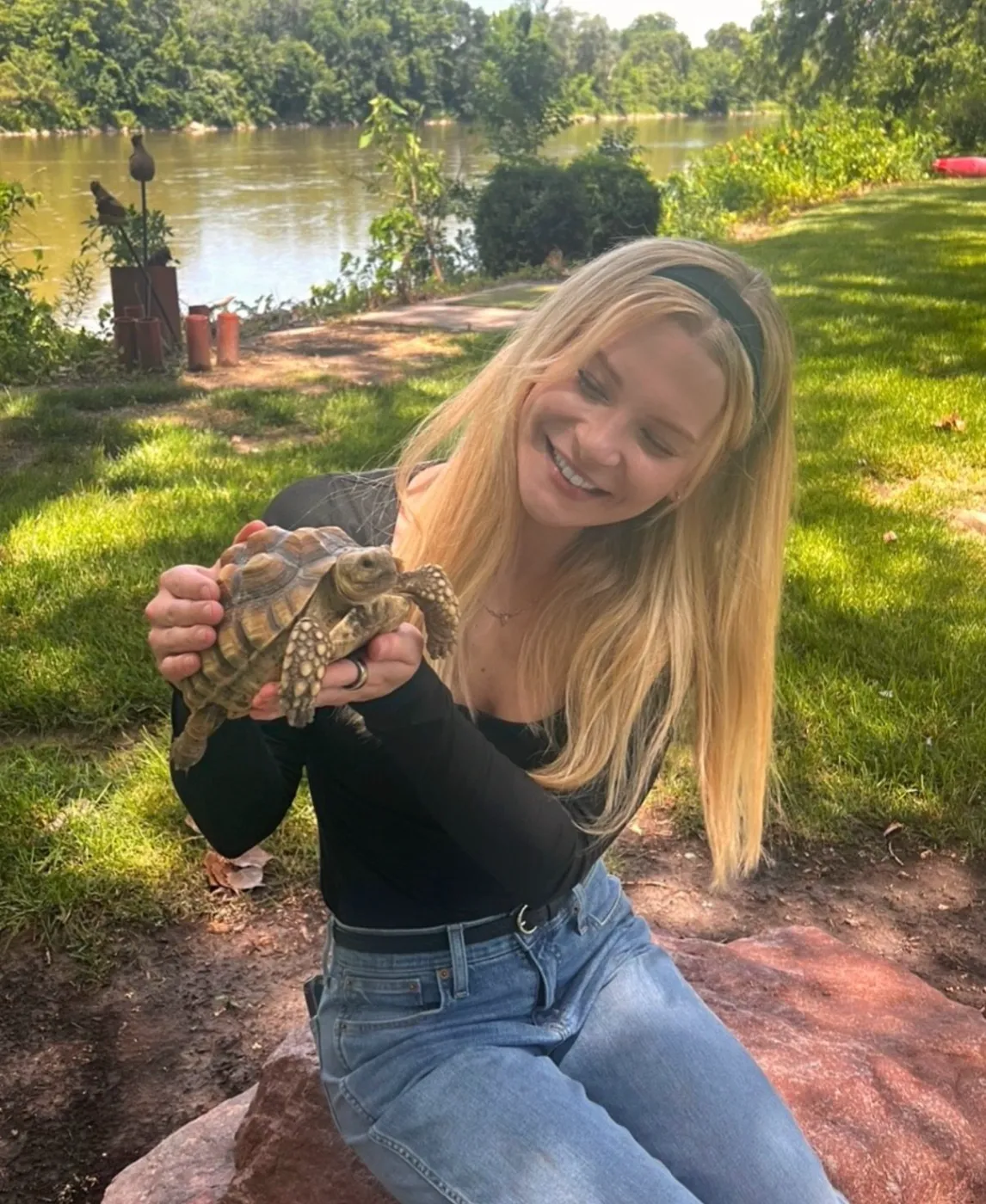 Exotic and reptile pet care in Denver — Lexie holding a tortoise
